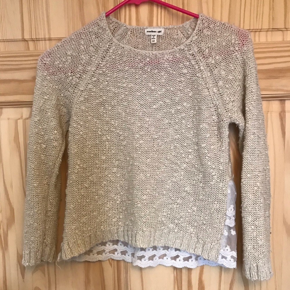Knit sweater with lace back.